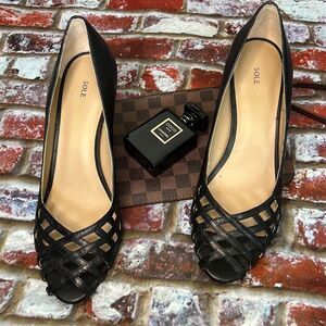 Sole Society Black leather heels with peep toe and Kris Kross detail